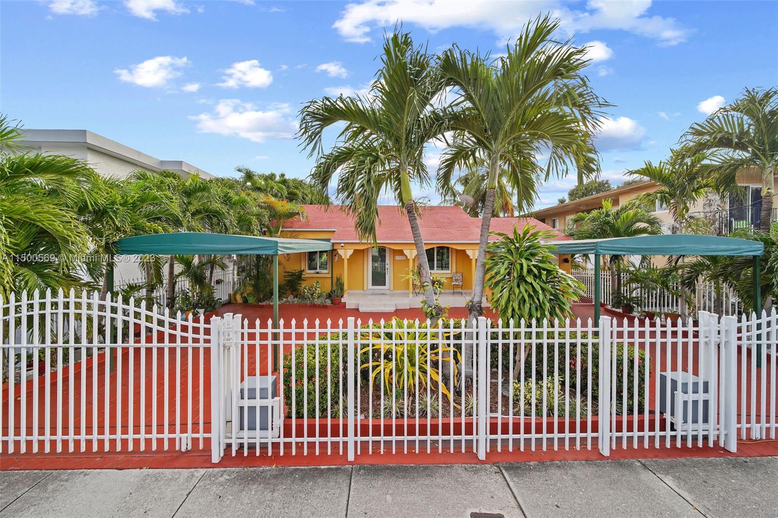 1828 Southwest 6th Street Miami, FL 33135 - Photo 50 of 50 a front view of a house with a garden