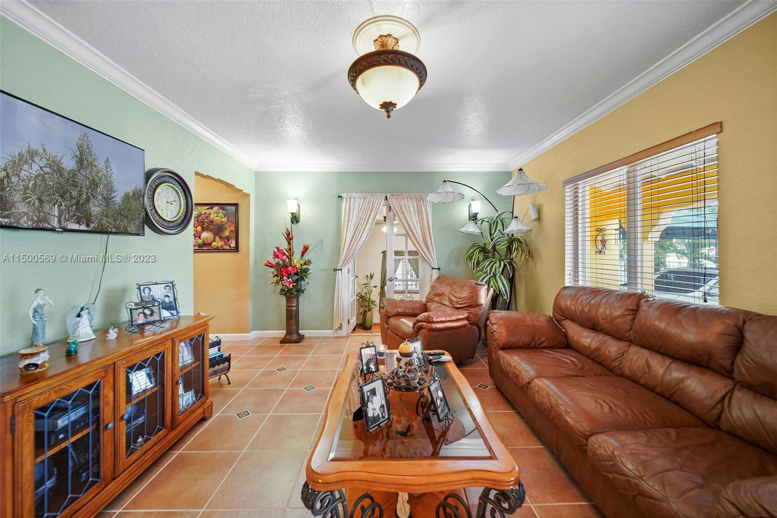 1828 Southwest 6th Street Miami, FL 33135 - Photo 6 of 50 a living room with furniture and a window