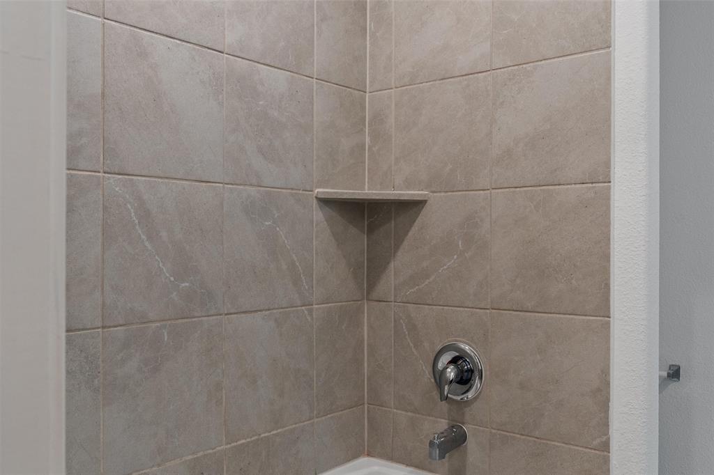 7781 Ruellia Road McKinney, TX 75071 - Photo 15 of 25 Bathroom view of shower / tub combination