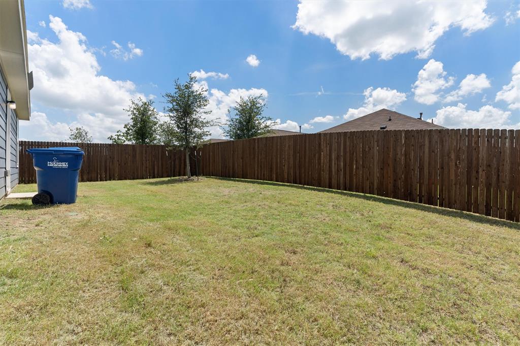 7781 Ruellia Road McKinney, TX 75071 - Photo 21 of 25 View of fenced backyard