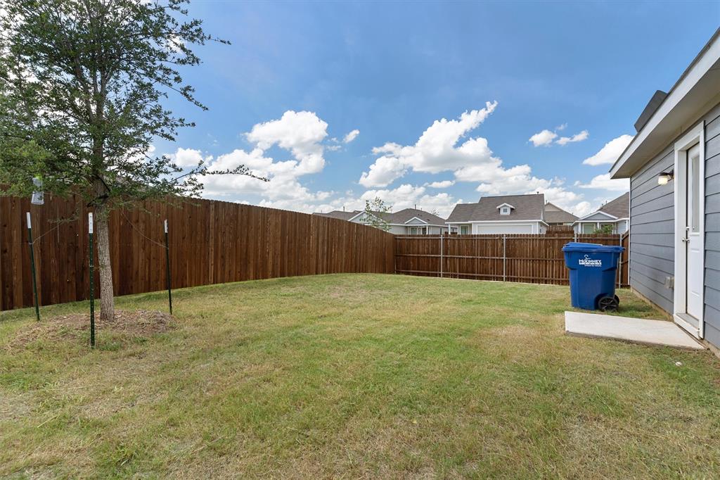 7781 Ruellia Road McKinney, TX 75071 - Photo 24 of 25 View of fenced backyard