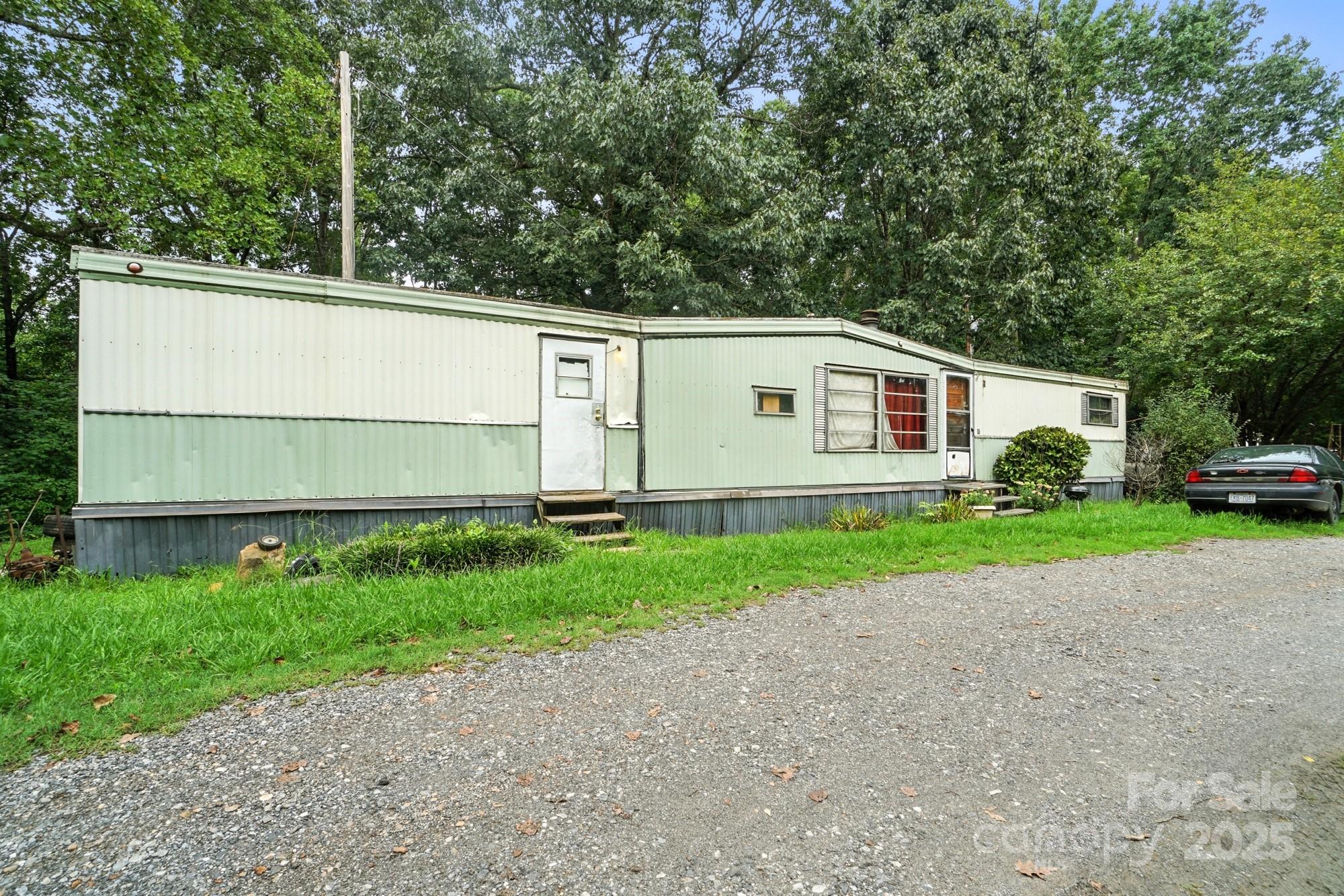 450 Dixon School Road Kings Mountain, NC 28086 - Photo 17 of 22 a view of a house with a backyard