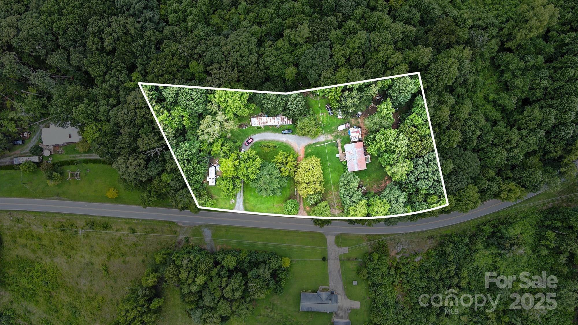 450 Dixon School Road Kings Mountain, NC 28086 - Photo 3 of 22 a view of a small yard