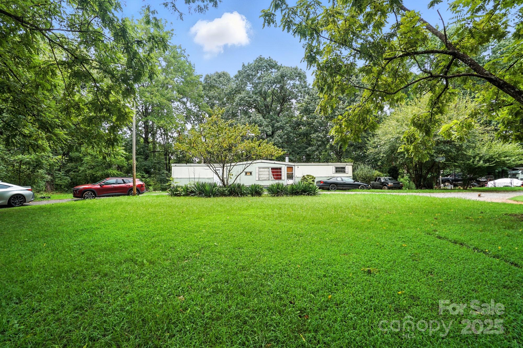 450 Dixon School Road Kings Mountain, NC 28086 - Photo 4 of 22 a front view of a house with a yard