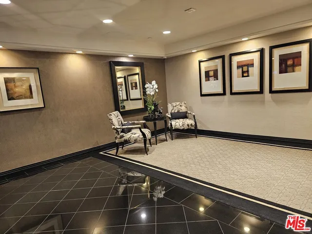 a room with gym equipment and a large window