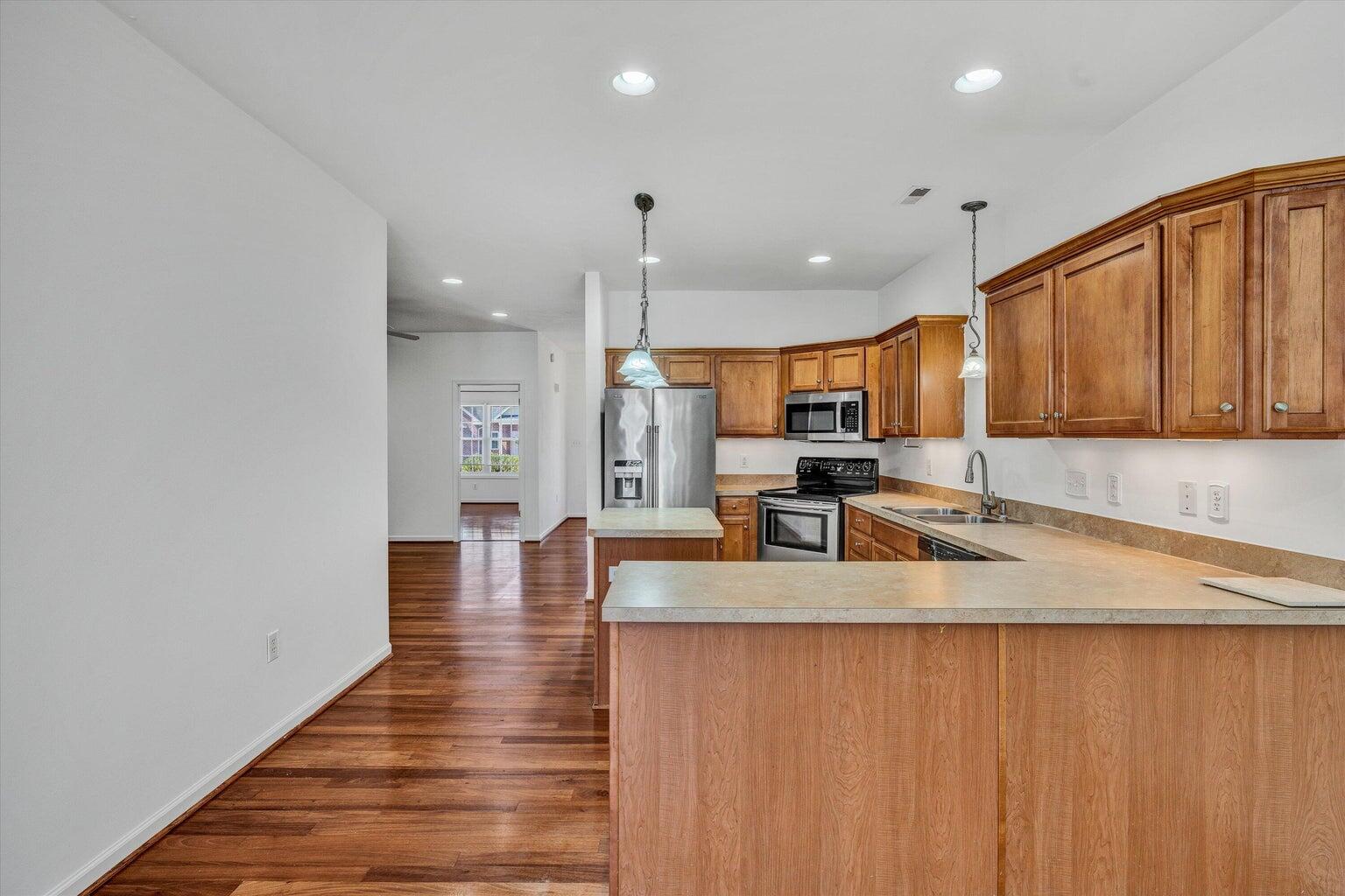88 Maple Street Salem, VA 24153 - Photo 12 of 25 a large kitchen with stainless steel appliances granite countertop a granite counter tops and a view of living room