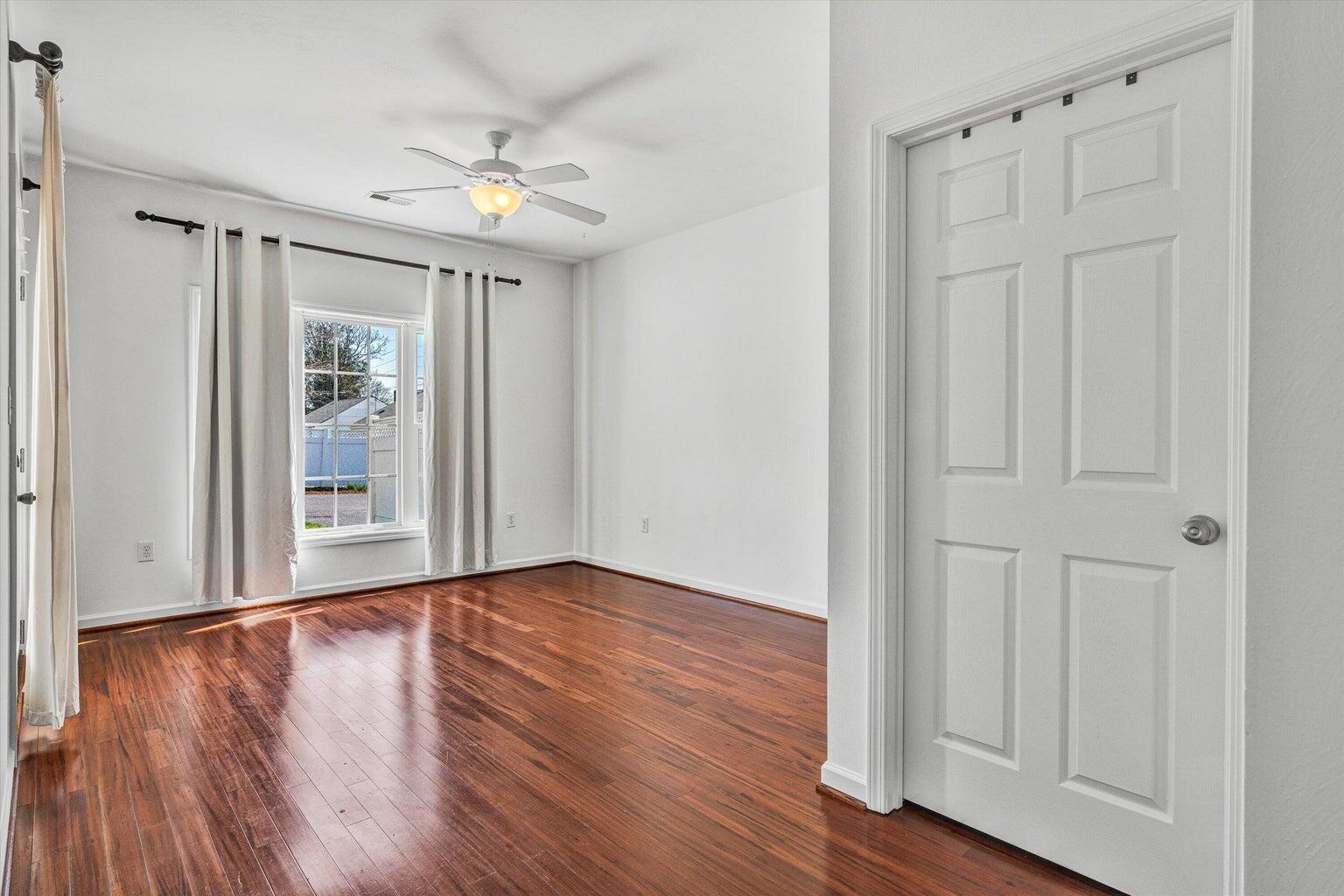 88 Maple Street Salem, VA 24153 - Photo 15 of 25 a view of an empty room with wooden floor