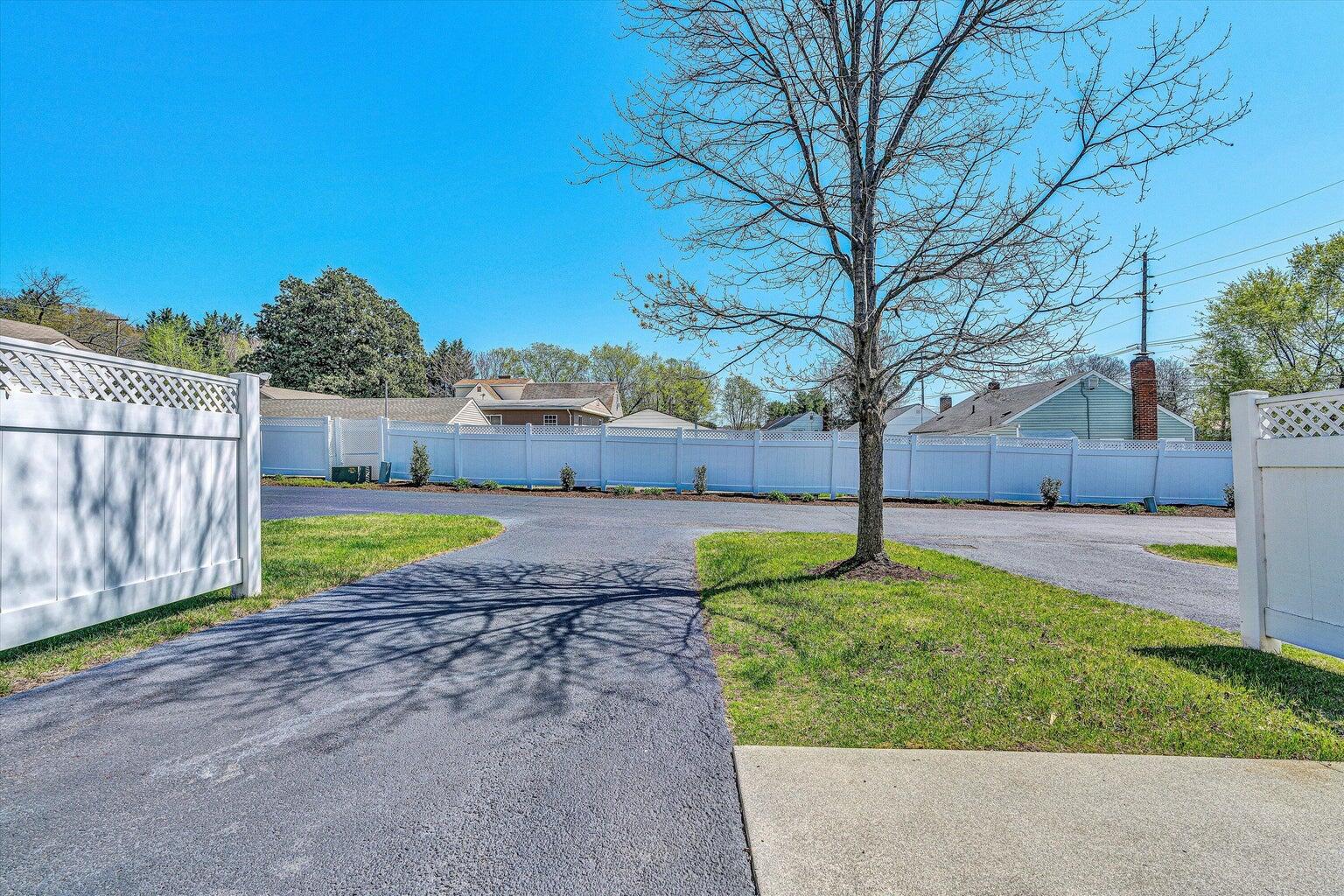 88 Maple Street Salem, VA 24153 - Photo 22 of 25 a view of a garden with a slide