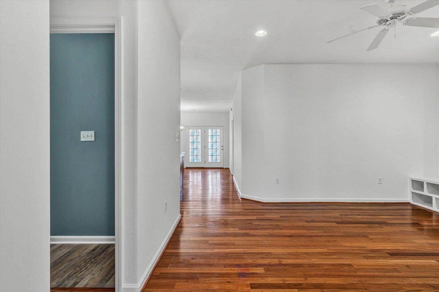 88 Maple Street Salem, VA 24153 - Photo 3 of 25 a view of a room with wooden floor and a window