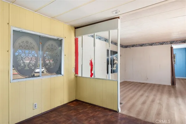 a bathroom with a sink a vanity and a mirror