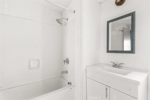 a view of a hallway with a chandelier