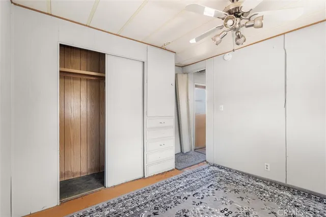 a kitchen with granite countertop a refrigerator and a stove