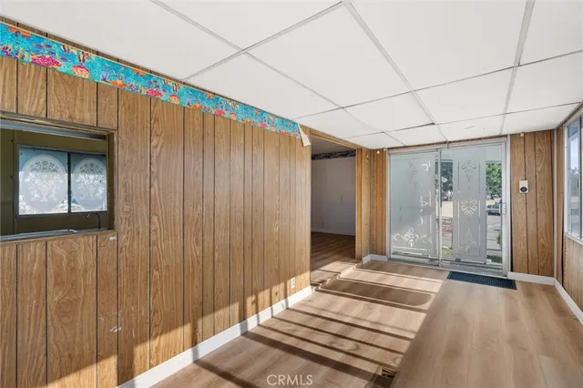a view of a bathroom with a tub and shower