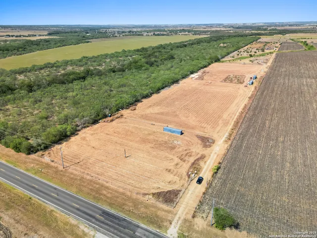 a view of a lake from a yard
