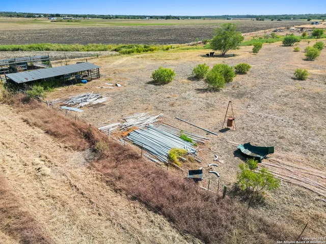 a view of a terrace with wooden floor and a lake view
