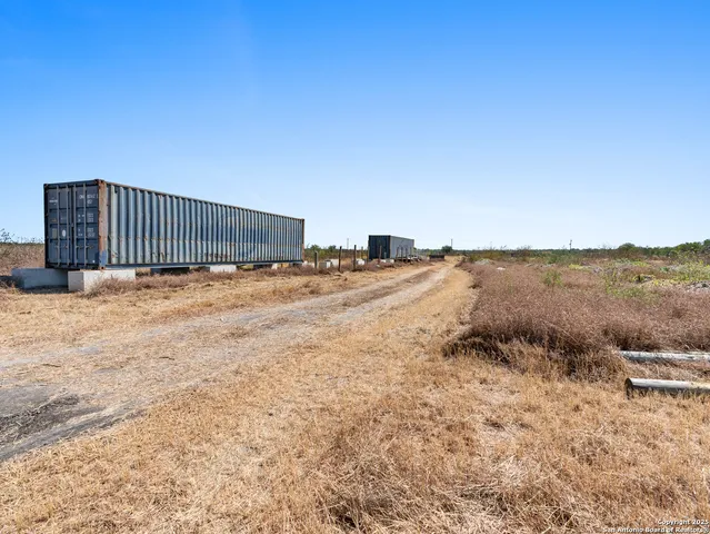 a view of open area with lake view