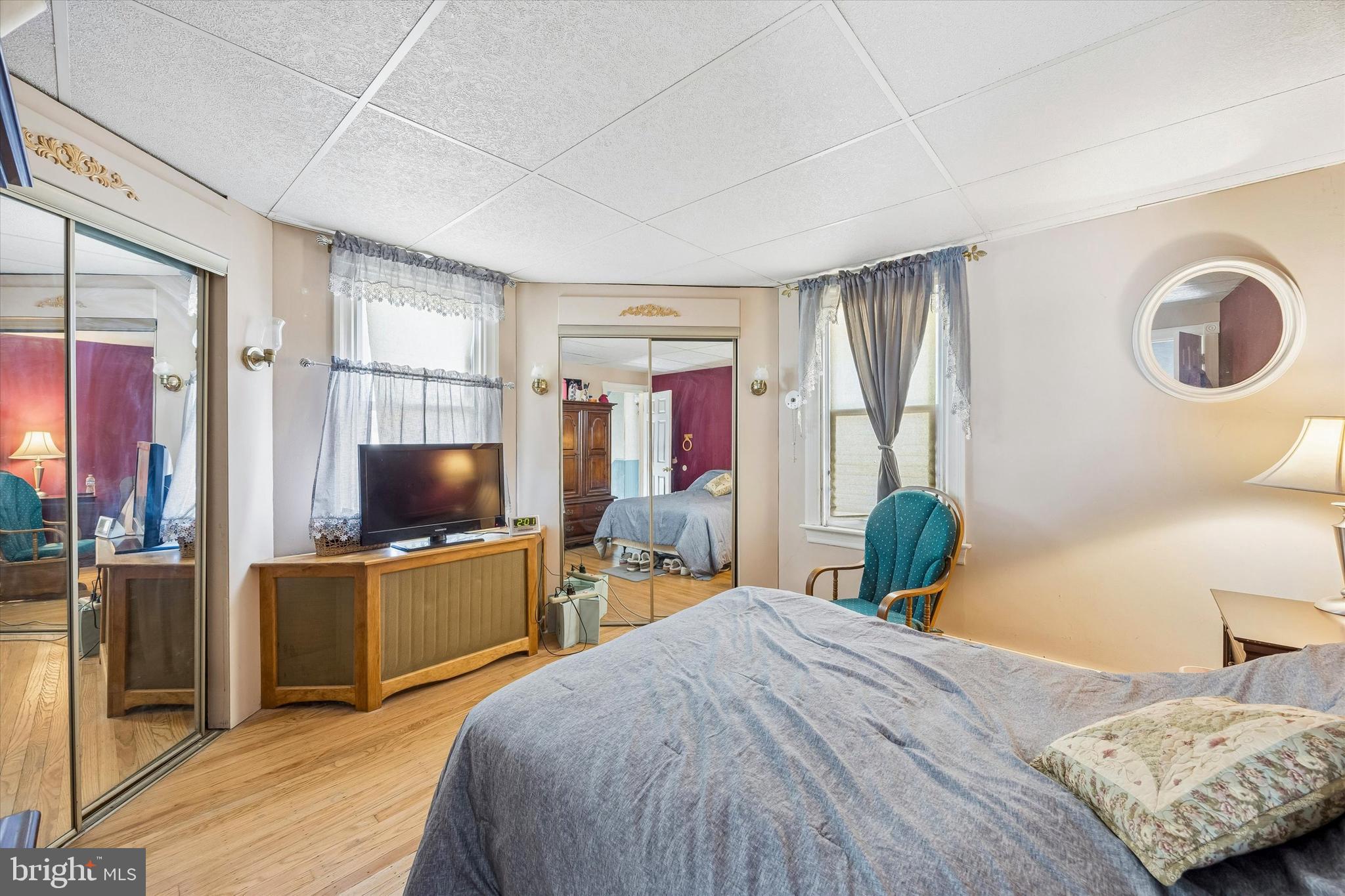 620 Gilbert Road Ridley Park, PA 19078 - Photo 20 of 35 a bedroom with a bed and wooden floor