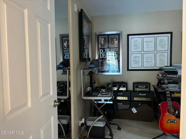 a view of a workspace with furniture and toys