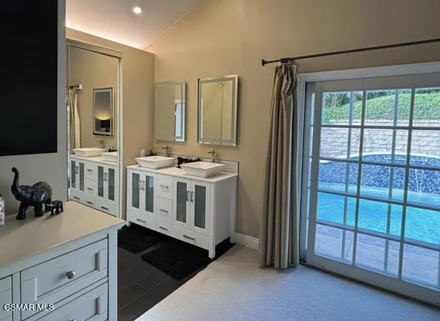 a kitchen with a sink and a window