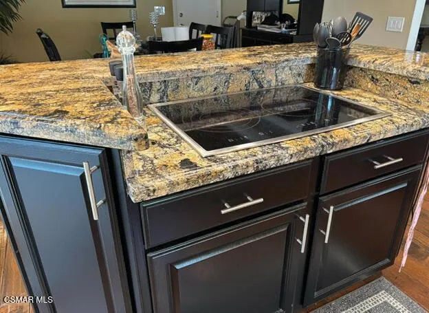 a sink with granite counter top
