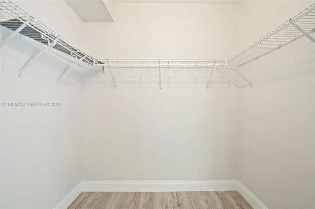 a swimming pool with outdoor seating and yard