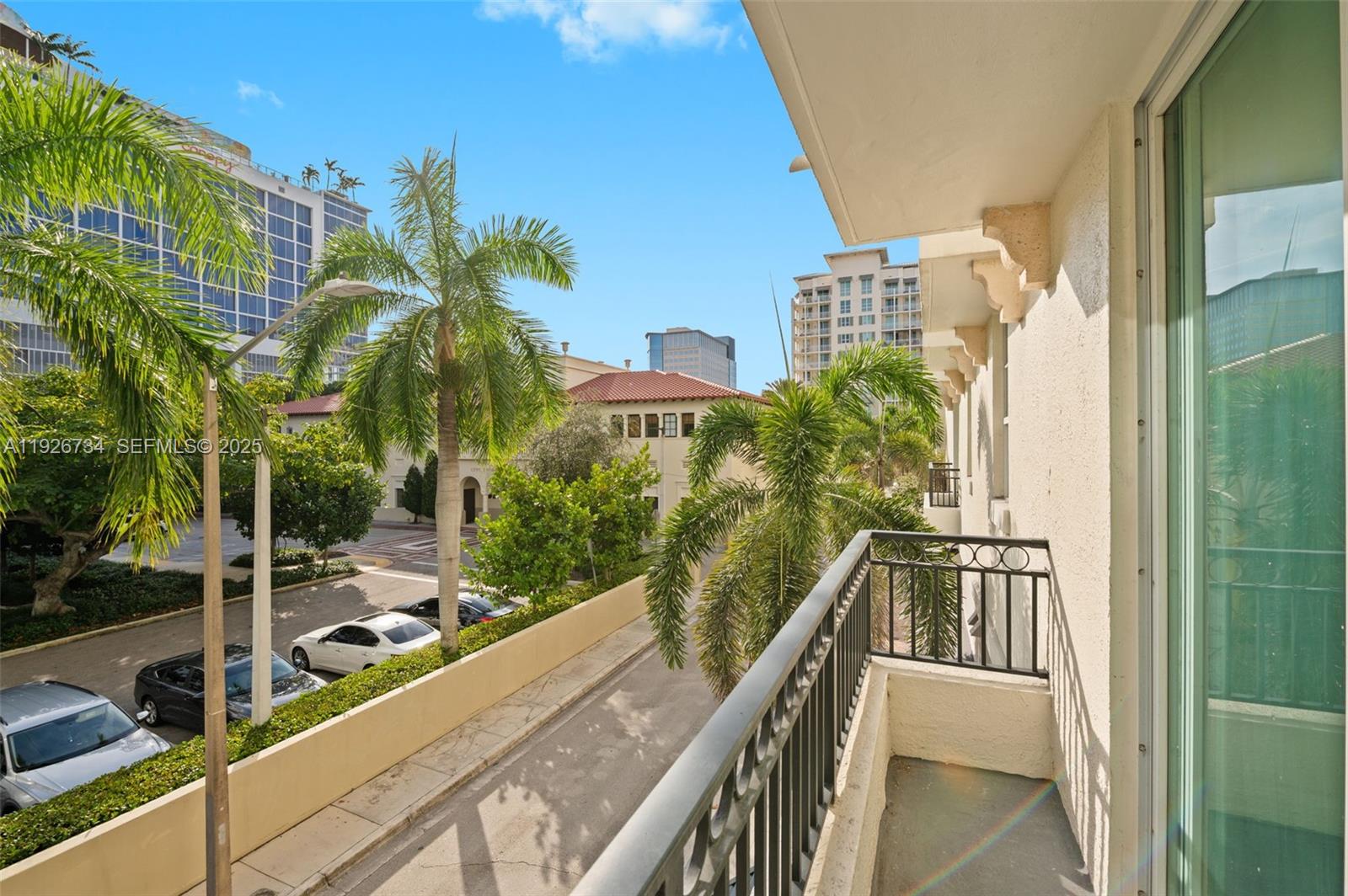 600 South Dixie Highway, Unit 237 West Palm Beach, FL 33401 - Photo 20 of 46 a view of a balcony with an outdoor space