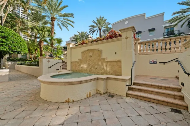 a view of a house with fountain bath tub and entertaining space