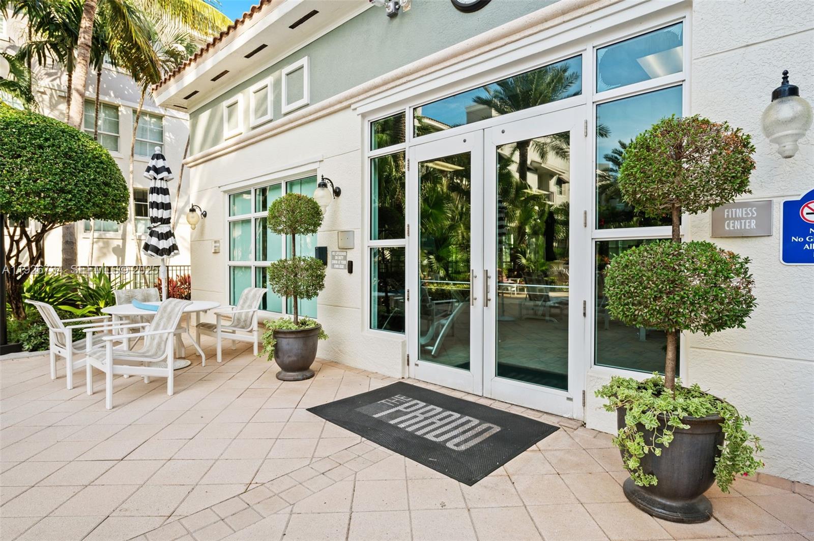 600 South Dixie Highway, Unit 237 West Palm Beach, FL 33401 - Photo 25 of 46 a view of a chairs and table in a patio