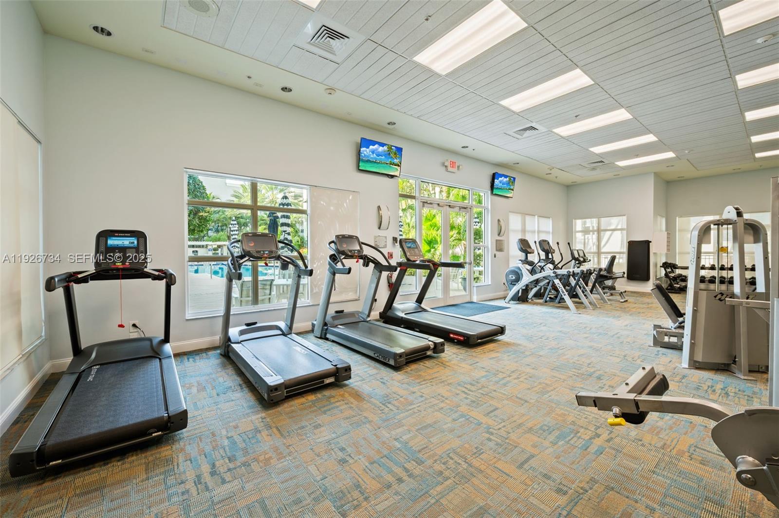 600 South Dixie Highway, Unit 237 West Palm Beach, FL 33401 - Photo 26 of 46 a view of a room with gym equipment