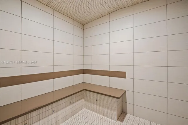 a view of building with yard and staircase