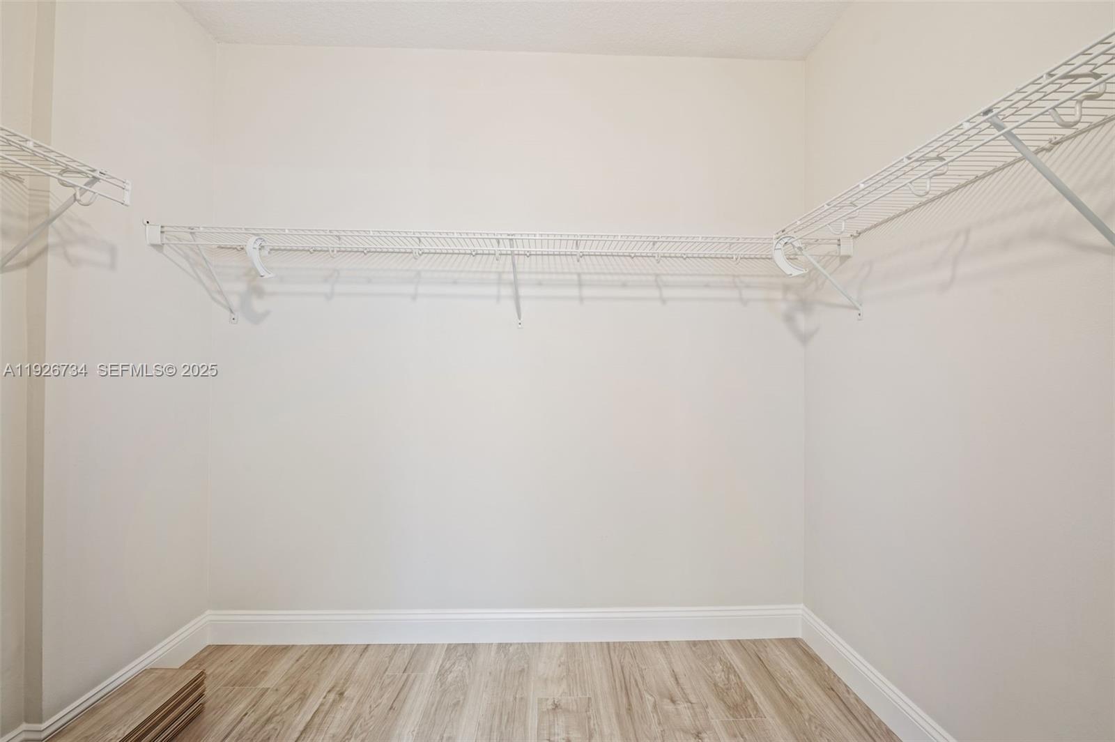 600 South Dixie Highway, Unit 237 West Palm Beach, FL 33401 - Photo 46 of 46 a view of a room with racks on the wall