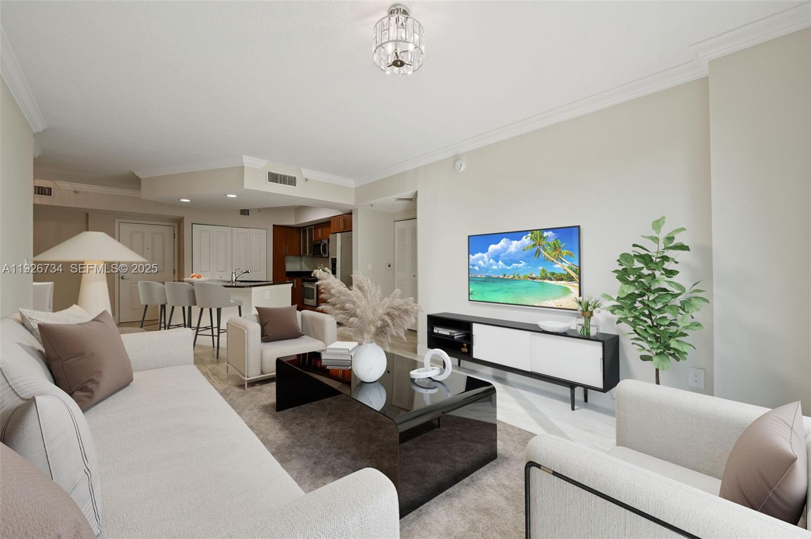 600 South Dixie Highway, Unit 237 West Palm Beach, FL 33401 - Photo 5 of 46 a living room with furniture and a flat screen tv