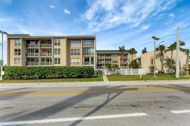 a view of a chairs and table in patio
