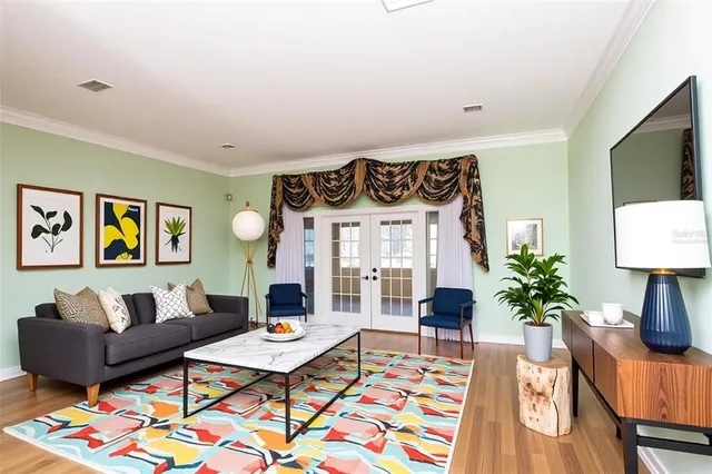 a view of a livingroom with wooden floor
