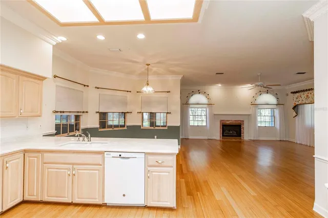 a living room with furniture and a piano