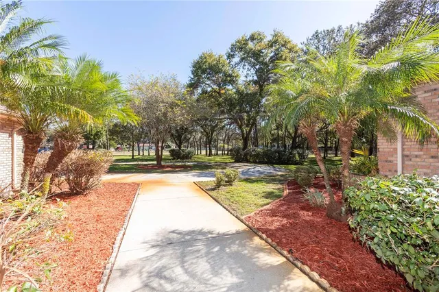 a view of a room with wooden floor and staircase
