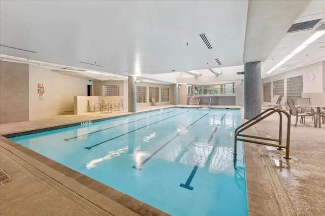 a view of a living room and kitchen