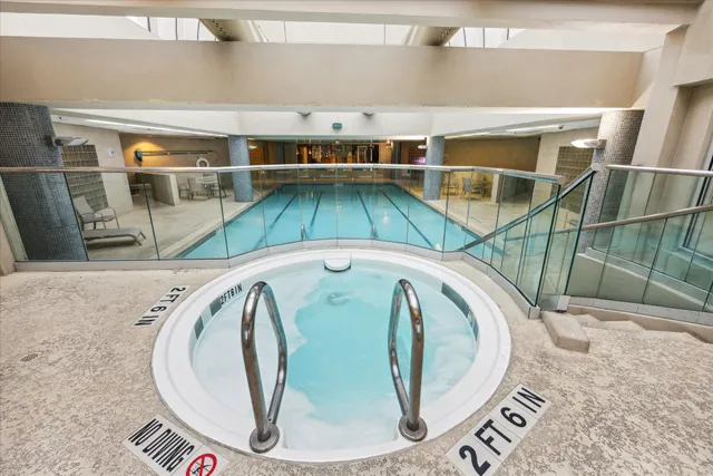 a view of a tall building with a yard