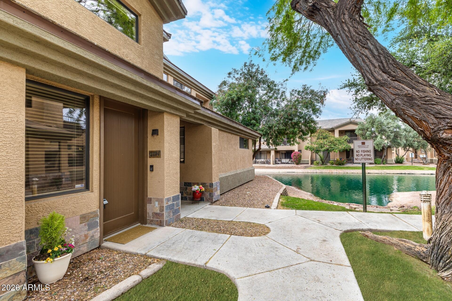 705 West Queen Creek Road, Unit 2114 Chandler, AZ 85248 - Photo 2 of 36 a view of backyard with swimming pool and seating