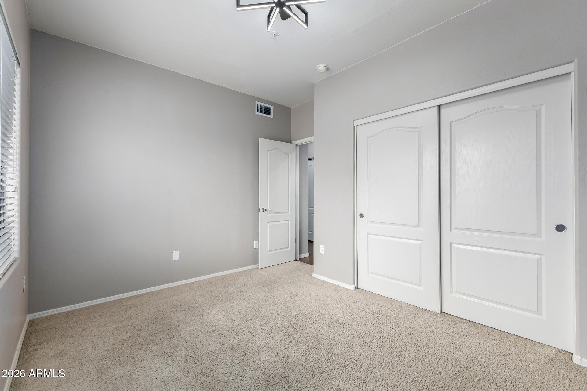 705 West Queen Creek Road, Unit 2114 Chandler, AZ 85248 - Photo 27 of 36 a view of an empty room