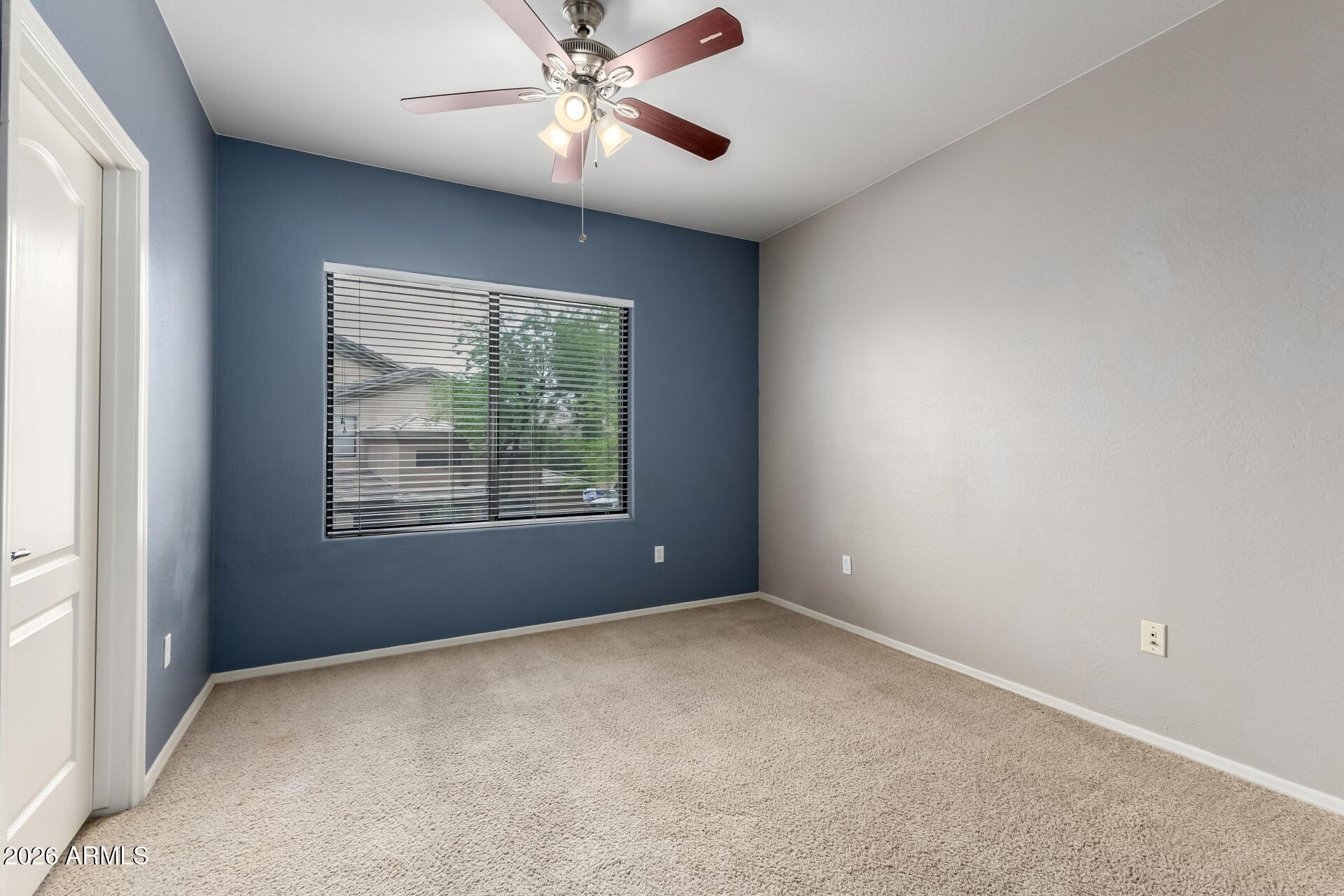 705 West Queen Creek Road, Unit 2114 Chandler, AZ 85248 - Photo 30 of 36 a view of an empty room with a window