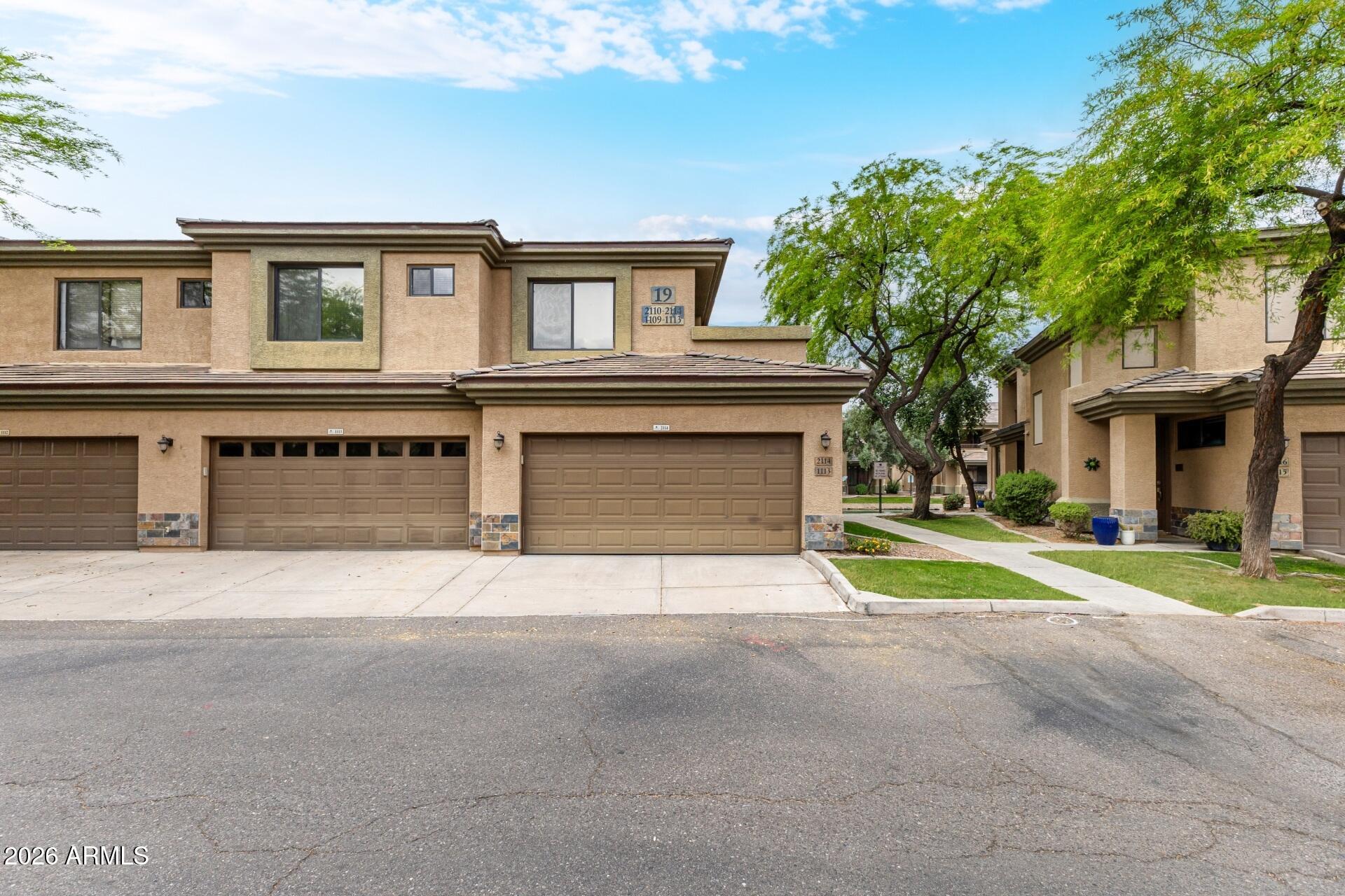 705 West Queen Creek Road, Unit 2114 Chandler, AZ 85248 - Photo 6 of 36 a house view with a outdoor space
