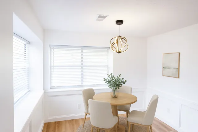 a bathroom with a sink and vanity