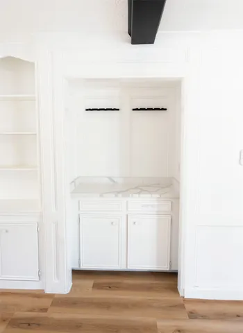 a view of a room with racks on the wall