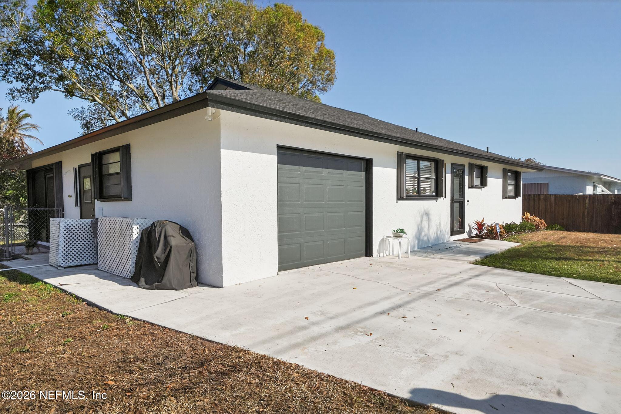 4543 Southeast Dryfus Avenue Stuart, FL 34997 - Photo 3 of 46 a view of a house with backyard