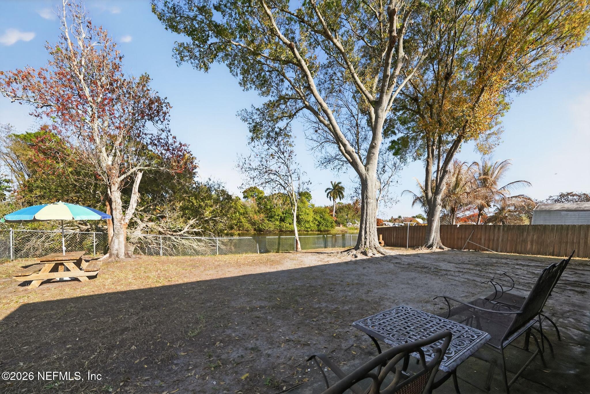 4543 Southeast Dryfus Avenue Stuart, FL 34997 - Photo 31 of 46 a view of backyard with green space