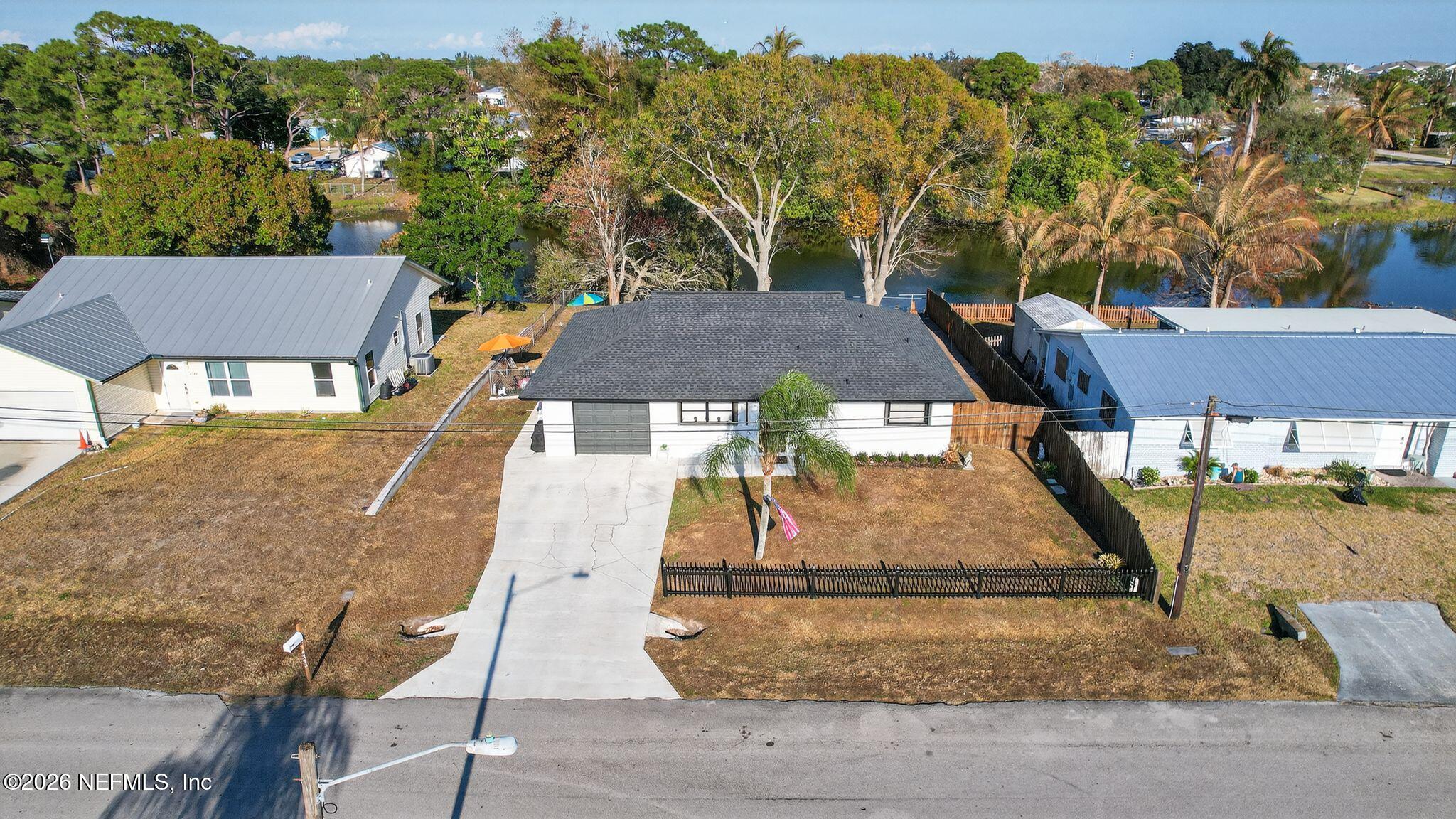 4543 Southeast Dryfus Avenue Stuart, FL 34997 - Photo 37 of 46 an aerial view of a house