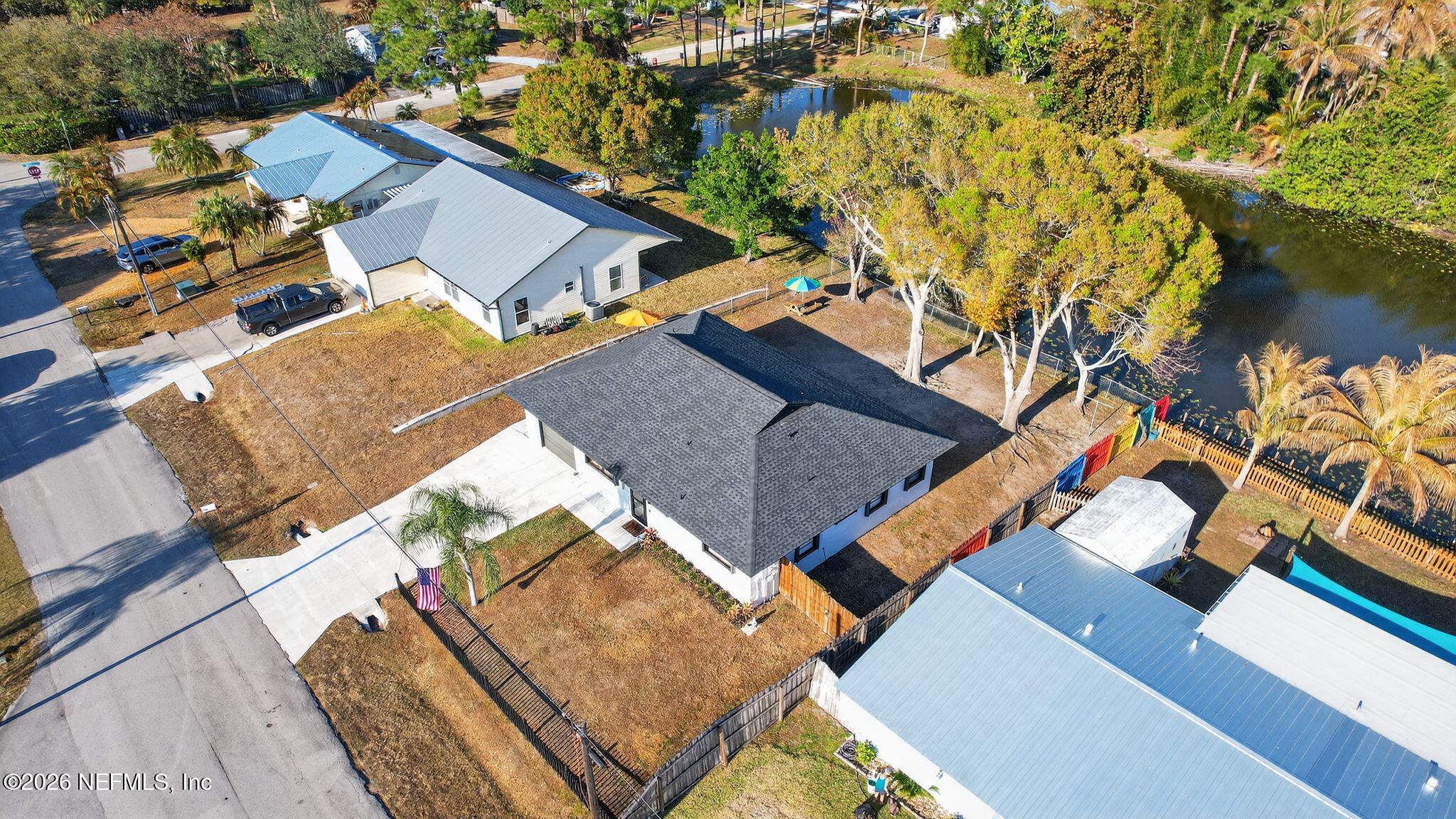 4543 Southeast Dryfus Avenue Stuart, FL 34997 - Photo 42 of 46 an aerial view of a house with a ocean view