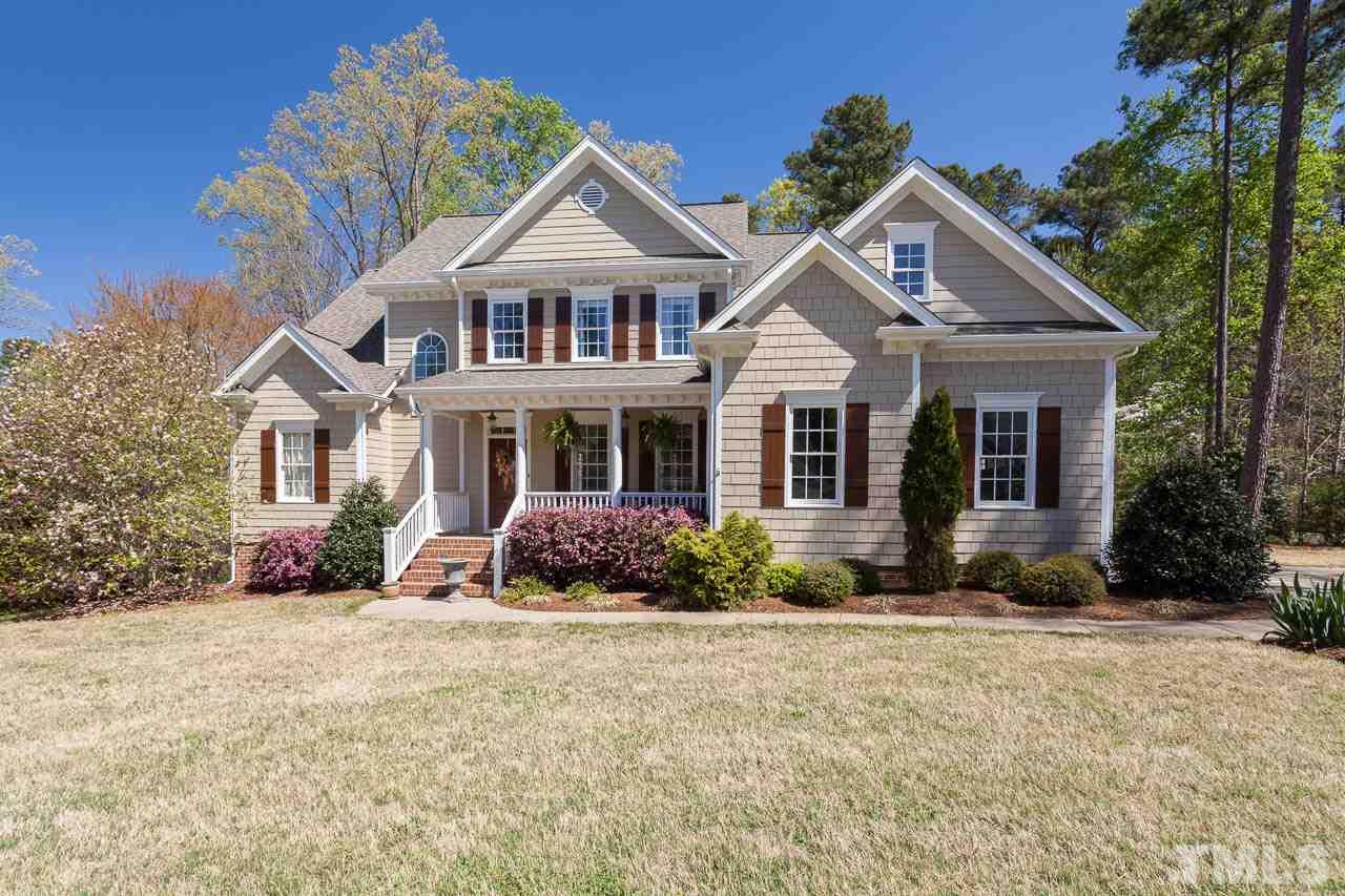 5216 Levering Mill Road Apex, NC 27539 - Photo 1 of 23 a front view of a house with a yard
