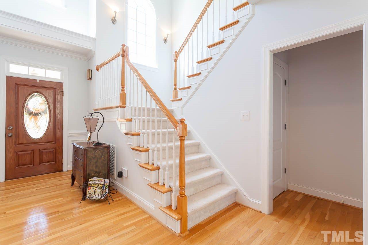 5216 Levering Mill Road Apex, NC 27539 - Photo 3 of 23 a view of entryway with wooden floor